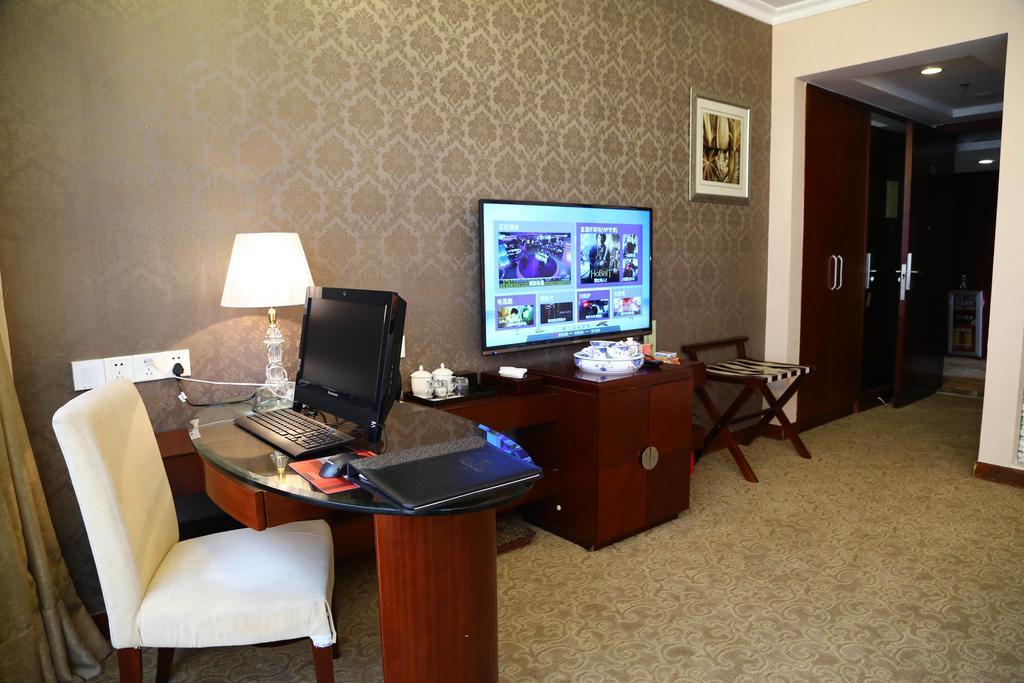 Long Zhou Grand Hotel Canton Chambre photo
