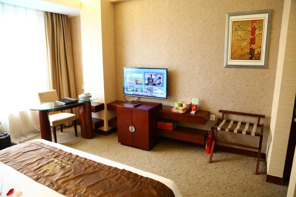Long Zhou Grand Hotel Canton Chambre photo