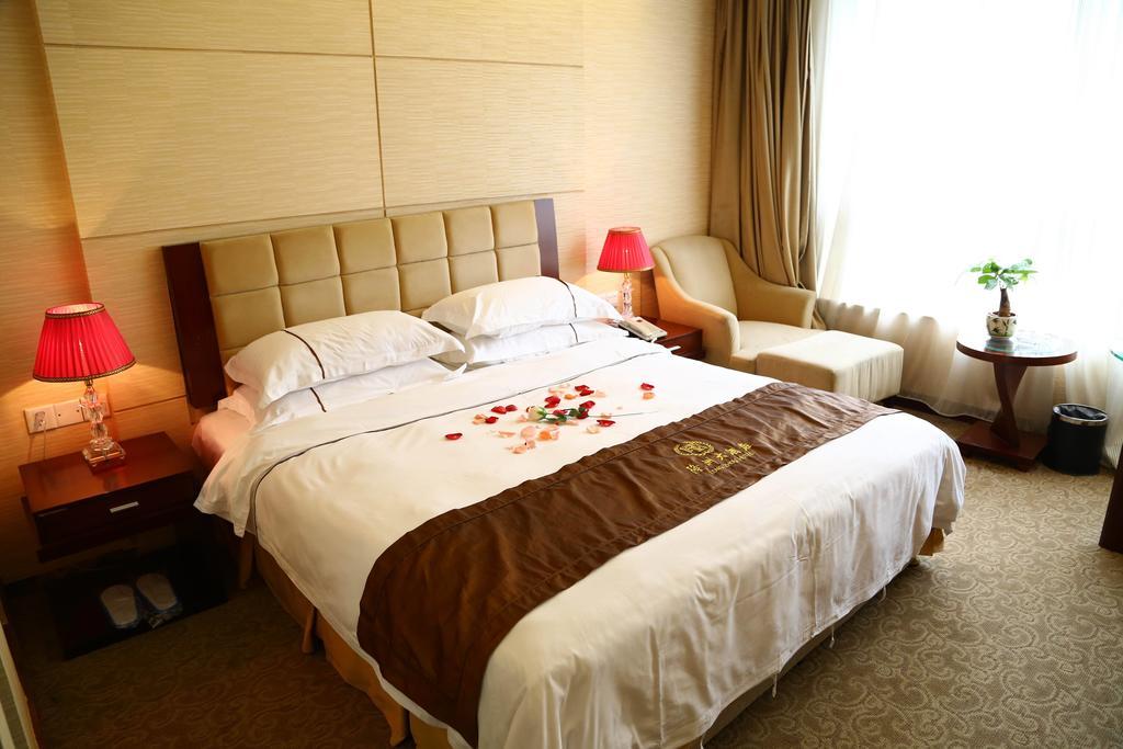 Long Zhou Grand Hotel Canton Chambre photo