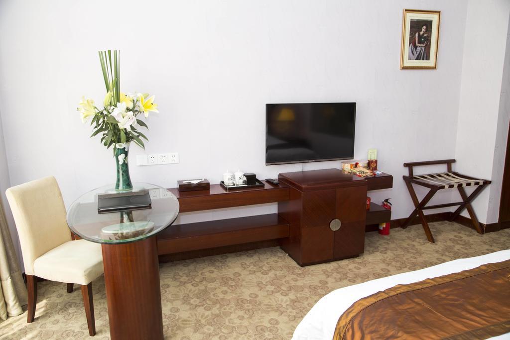 Long Zhou Grand Hotel Canton Chambre photo