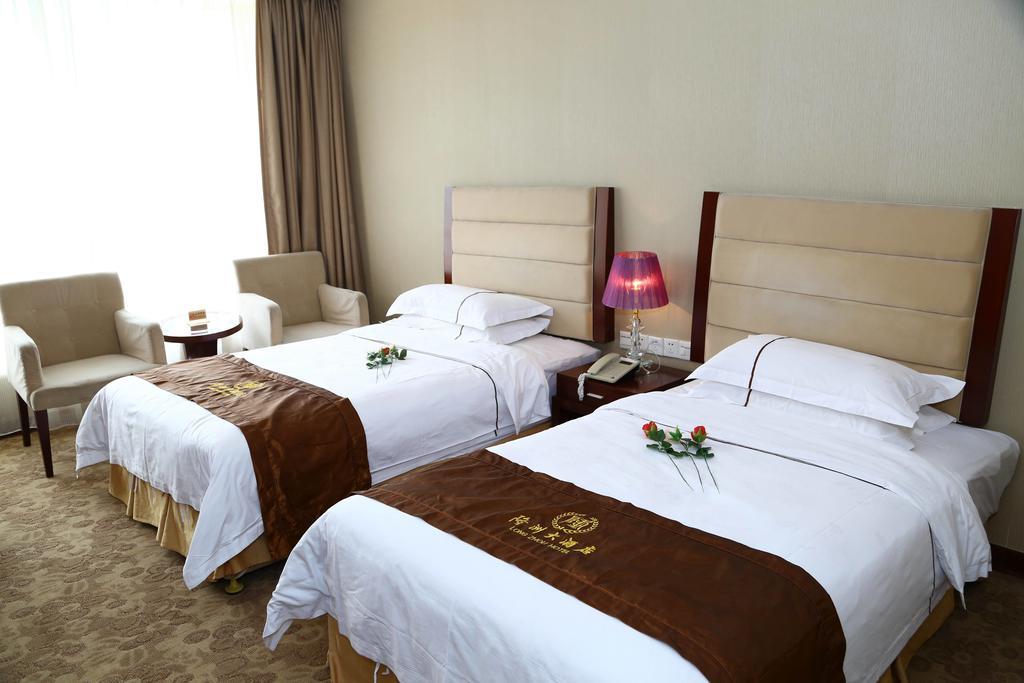 Long Zhou Grand Hotel Canton Chambre photo