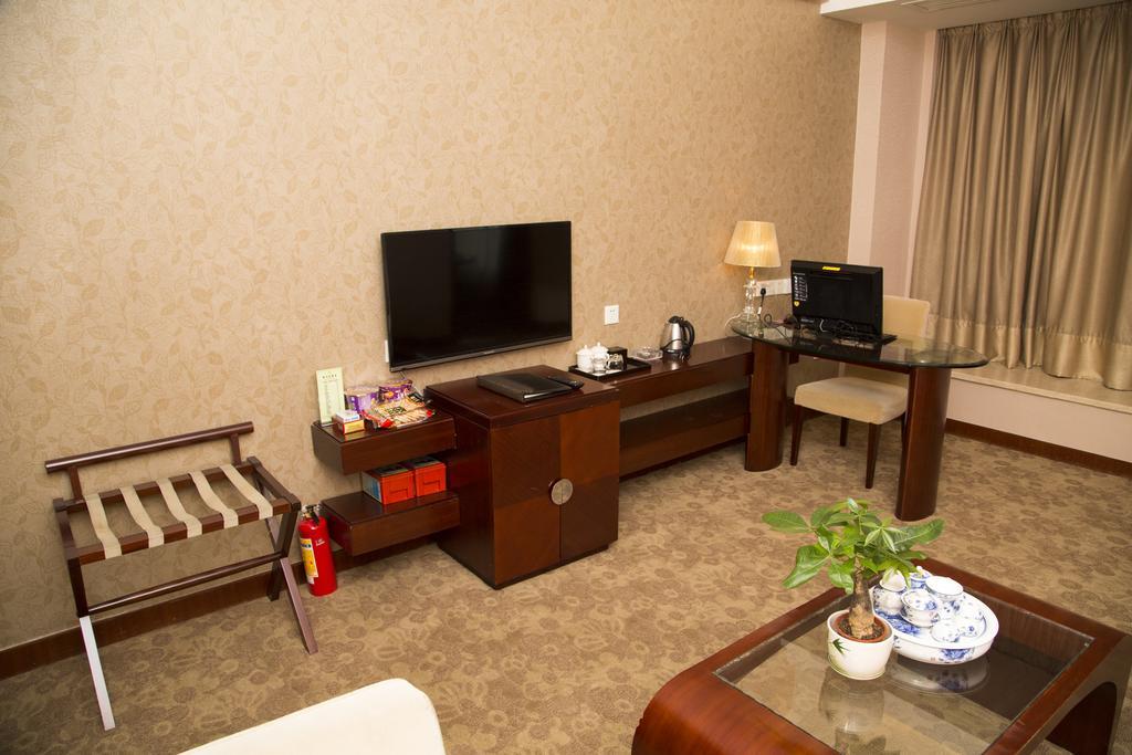 Long Zhou Grand Hotel Canton Chambre photo