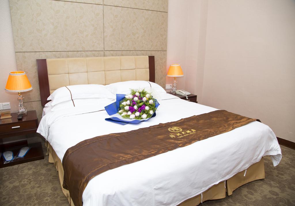 Long Zhou Grand Hotel Canton Chambre photo