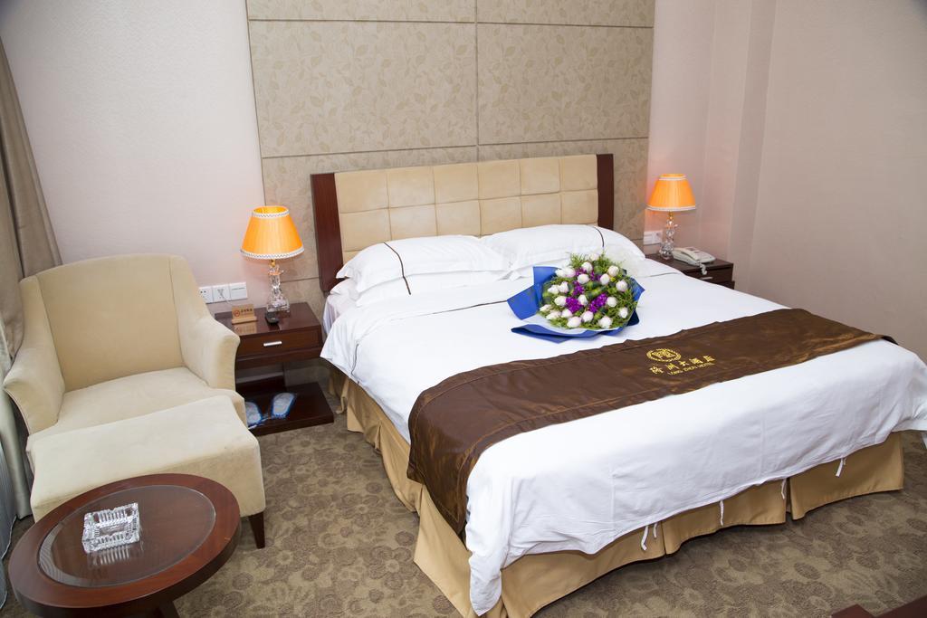 Long Zhou Grand Hotel Canton Chambre photo