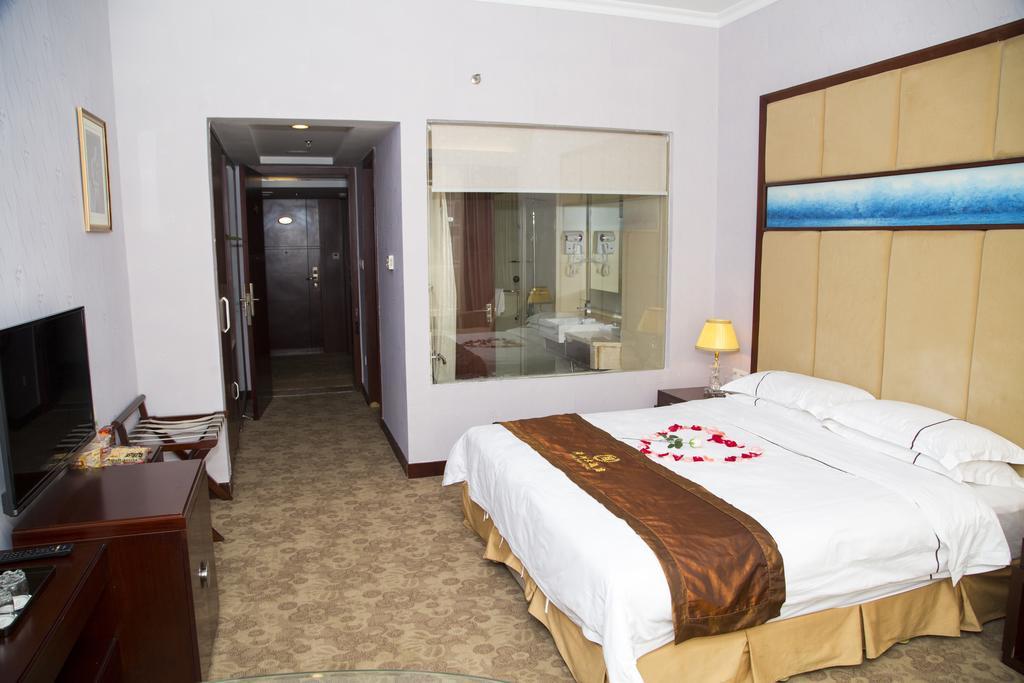 Long Zhou Grand Hotel Canton Chambre photo