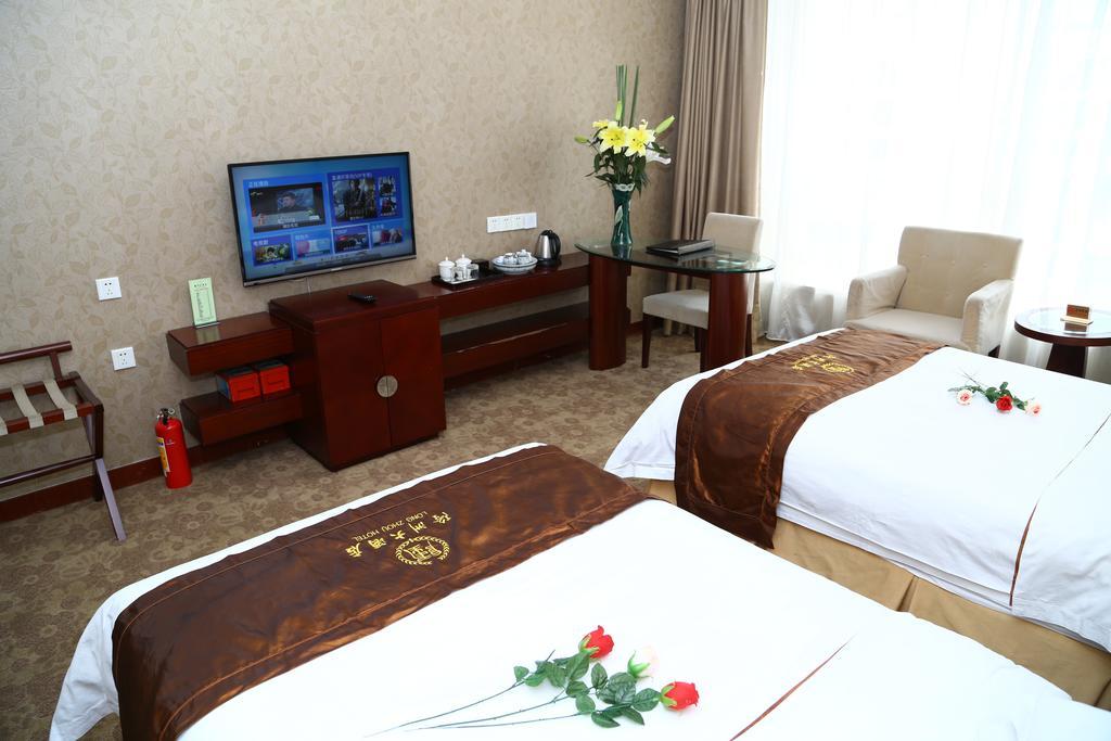 Long Zhou Grand Hotel Canton Chambre photo