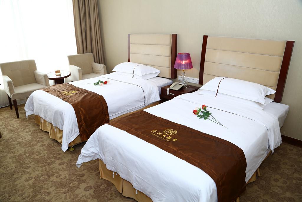 Long Zhou Grand Hotel Canton Chambre photo