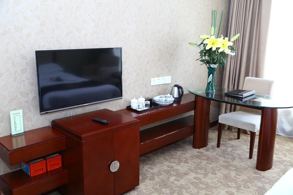 Long Zhou Grand Hotel Canton Chambre photo