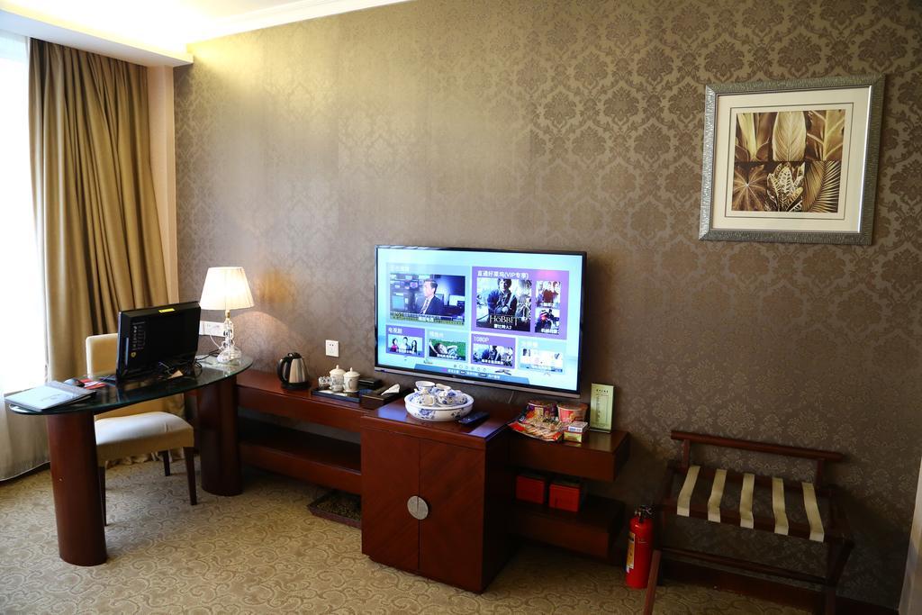 Long Zhou Grand Hotel Canton Chambre photo